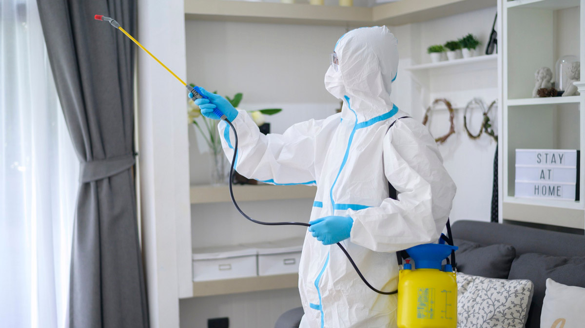 Technician treating home